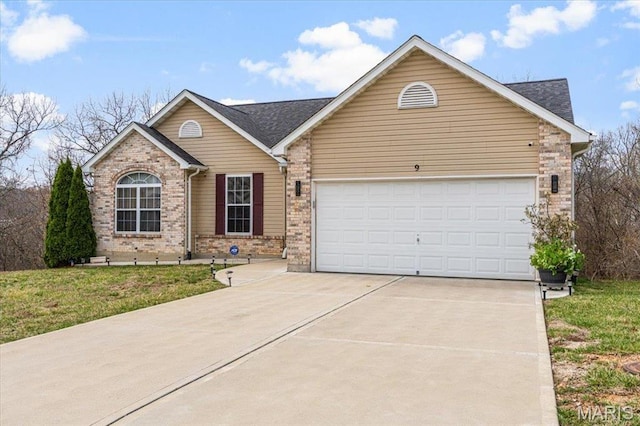 9 Amber Ridge Ct, High Ridge, MO 63049 - view of front of house with concrete driveway, an attached garage, brick siding, and roof with shingles