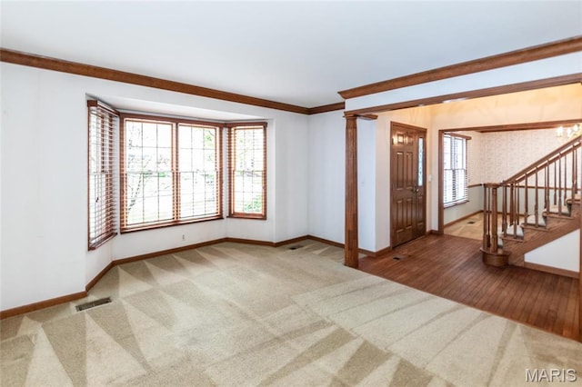 14 Webster Oaks Dr, Webster Groves, MO 63119 - carpeted foyer entrance with baseboards, stairway, and crown molding