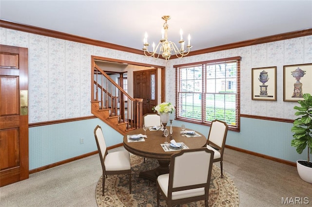 14 Webster Oaks Dr, Webster Groves, MO 63119 - carpeted dining room featuring wallpapered walls, a chandelier, baseboards, ornamental molding, and stairs