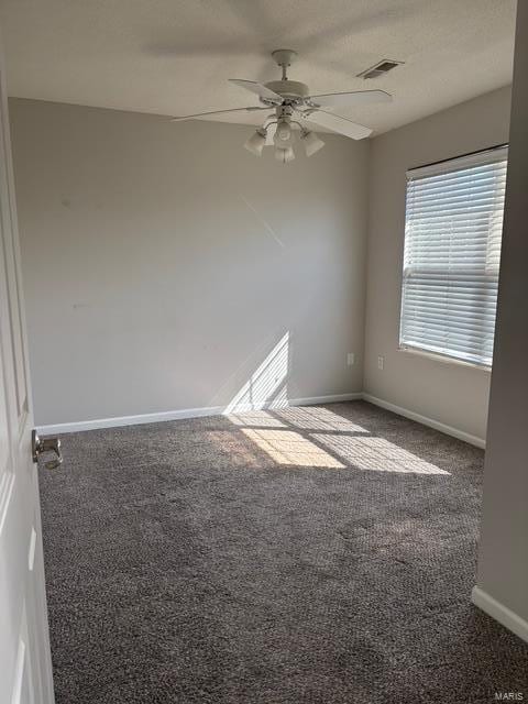 708 Michael St, Ofallon, IL 62269 - unfurnished room with carpet flooring, baseboards, and a ceiling fan