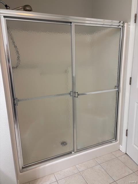 708 Michael St, Ofallon, IL 62269 - bathroom with tile patterned flooring and a shower stall