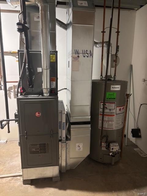 708 Michael St, Ofallon, IL 62269 - utility room featuring water heater