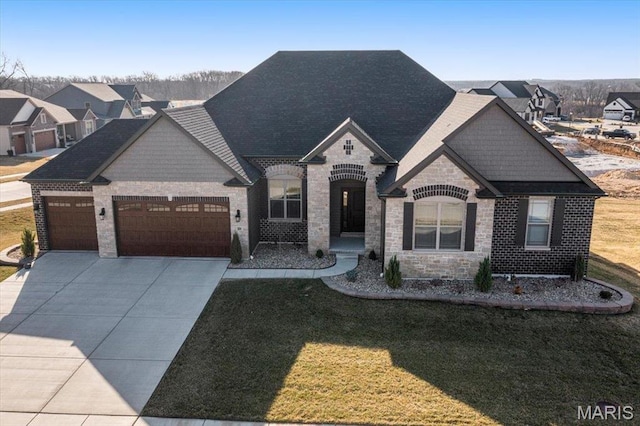504 Coppice Ct, Wentzville, MO 63385 - french country home featuring an attached garage, a front yard, stone siding, driveway, and roof with shingles
