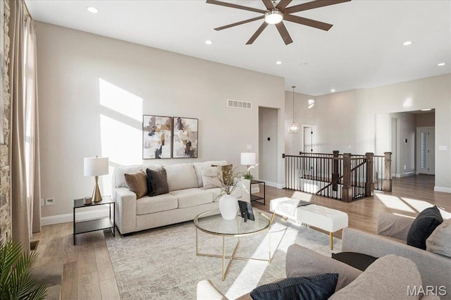 504 Coppice Ct, Wentzville, MO 63385 - living room featuring ceiling fan, wood finished floors, recessed lighting, and baseboards