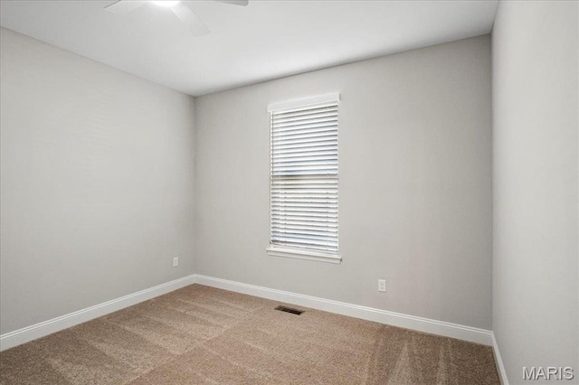 504 Coppice Ct, Wentzville, MO 63385 - carpeted spare room with ceiling fan and baseboards