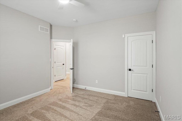 504 Coppice Ct, Wentzville, MO 63385 - unfurnished bedroom with carpet, baseboards, and ceiling fan