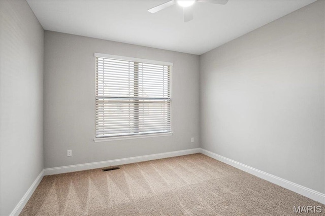 504 Coppice Ct, Wentzville, MO 63385 - empty room with a ceiling fan, carpet, and baseboards