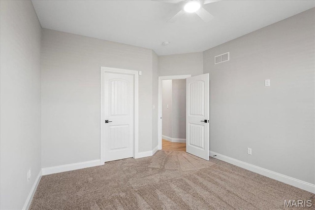 504 Coppice Ct, Wentzville, MO 63385 - unfurnished bedroom featuring carpet floors, baseboards, and ceiling fan