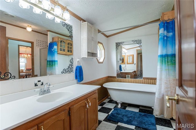 751 High St, Edgar Springs, MO 65462 - full bathroom featuring crown molding, wainscoting, a textured ceiling, tile patterned floors, and vanity