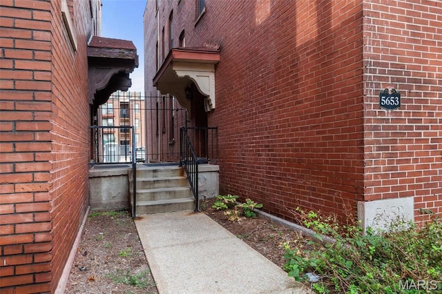 5653 Waterman Blvd Unit 3N, Saint Louis, MO 63112 - view of exterior entry with brick siding