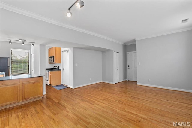 5653 Waterman Blvd Unit 3N, Saint Louis, MO 63112 - unfurnished living room featuring track lighting, light wood-style floors, ornamental molding, and baseboards