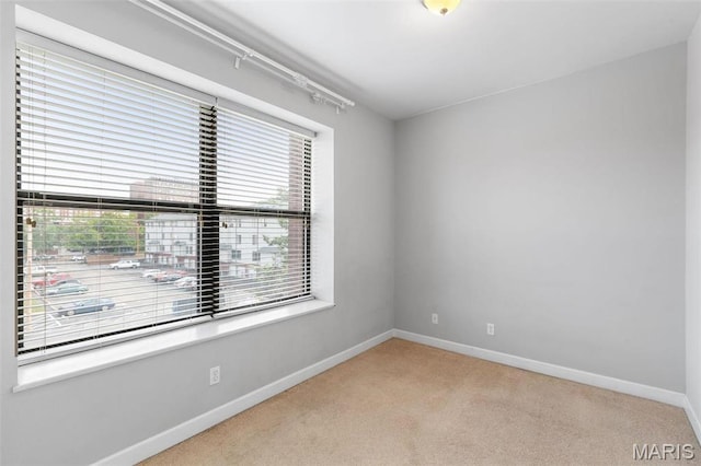 5653 Waterman Blvd Unit 3N, Saint Louis, MO 63112 - carpeted spare room featuring baseboards