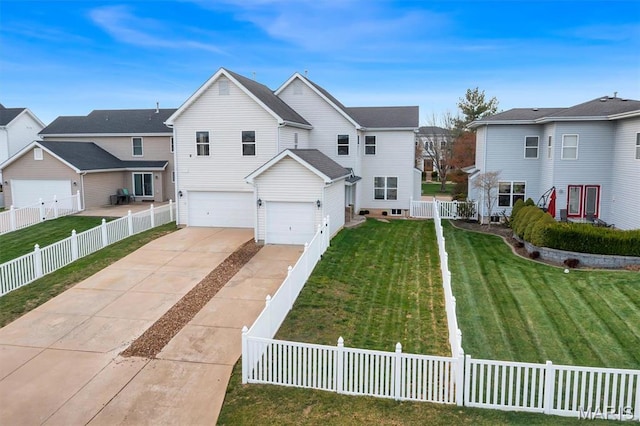 traditional home with a garage, driveway, and a residential view