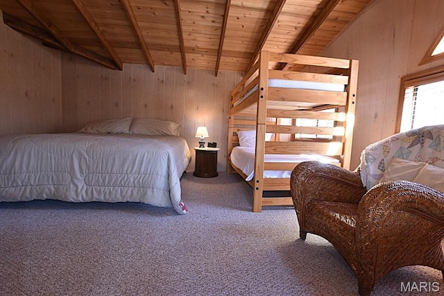 carpeted bedroom with wooden ceiling and wood walls