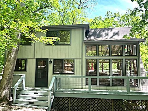 856 Aspen Lake Dr, Innsbrook, MO 63390 - rear view of house with a deck