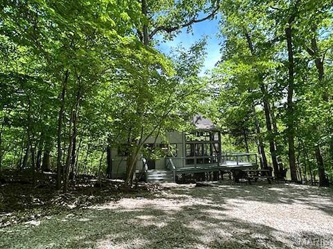 856 Aspen Lake Dr, Innsbrook, MO 63390 - back of property featuring a wooden deck