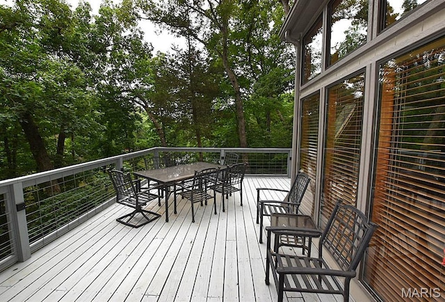 856 Aspen Lake Dr, Innsbrook, MO 63390 - wooden terrace with outdoor dining space