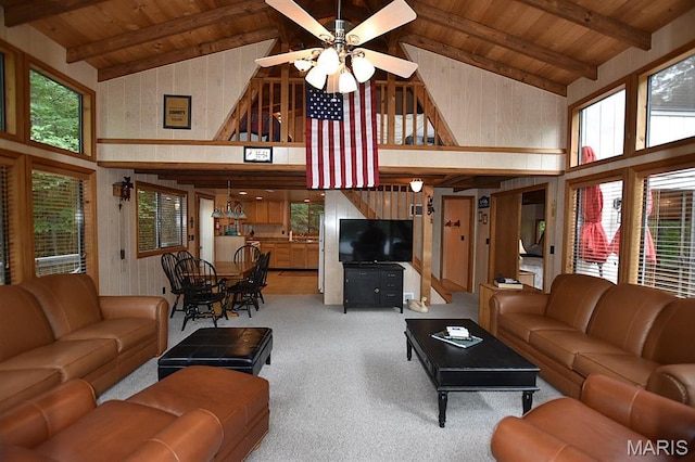 856 Aspen Lake Dr, Innsbrook, MO 63390 - living room featuring high vaulted ceiling, a wood ceiling with exposed beams, ceiling fan, and carpet