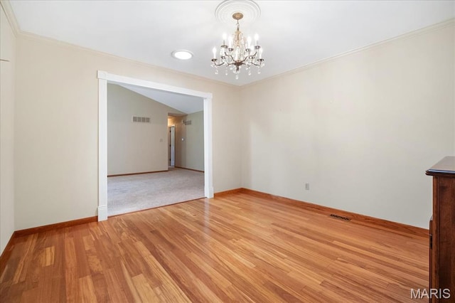 221 Greiner Ct, Ellisville, MO 63021 - unfurnished room featuring a chandelier, crown molding, light wood-style floors, and recessed lighting