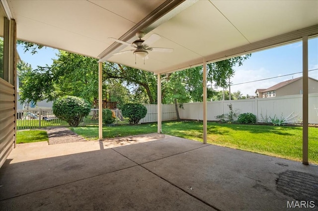 221 Greiner Ct, Ellisville, MO 63021 - fenced backyard with a ceiling fan and a patio area