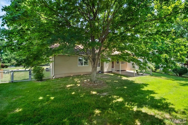 221 Greiner Ct, Ellisville, MO 63021 - fenced backyard featuring a patio and a gate
