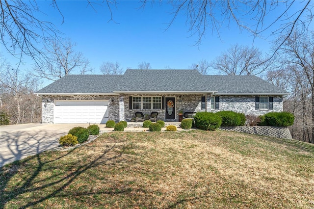 view of front of property featuring a porch, a garage, a front yard, concrete driveway, and roof with shingles