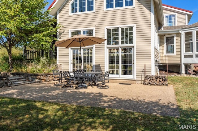 507 Leach Branch Rd, Hermann, MO 65041 - rear view of house featuring a patio area, fence, and central AC