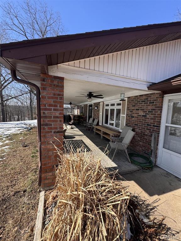 27409 Missouri Dr, Lebanon, MO 65536 - view of patio / terrace with a ceiling fan