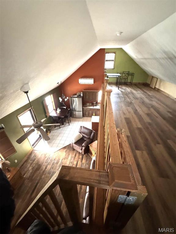 27409 Missouri Dr, Lebanon, MO 65536 - bonus room with wood finished floors, lofted ceiling, and a ceiling fan