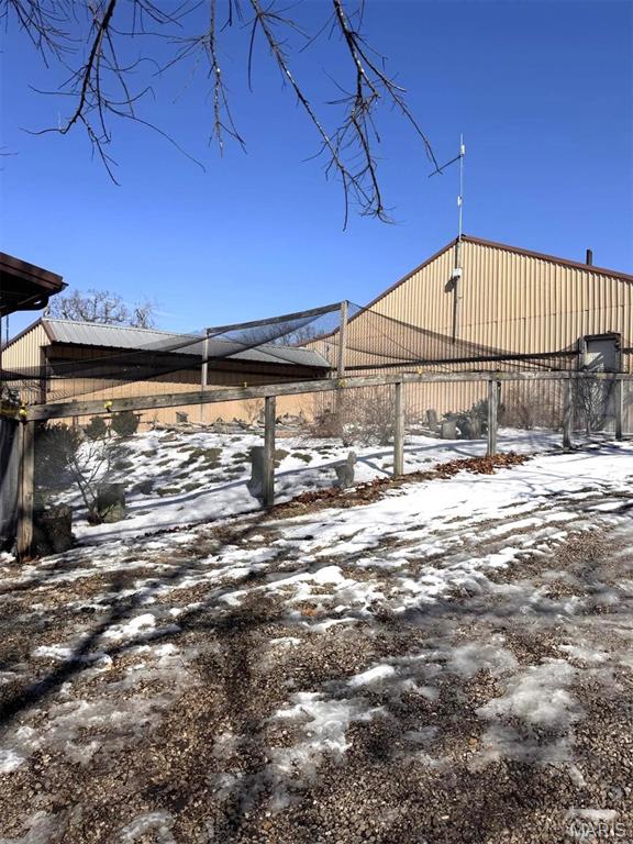 27409 Missouri Dr, Lebanon, MO 65536 - view of snowy yard
