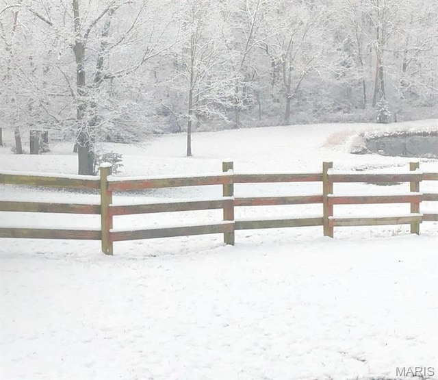 27409 Missouri Dr, Lebanon, MO 65536 - yard covered in snow featuring fence