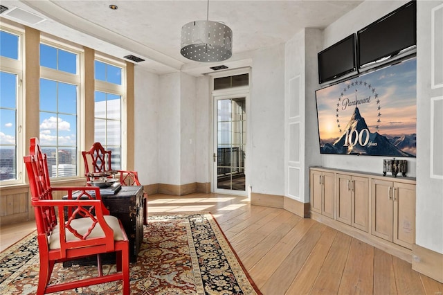 150 Carondelet Unit 2901, Saint Louis, MO 63105 - living area with light wood-style floors and baseboards
