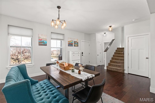 3208 Henrietta St, Saint Louis, MO 63104 - dining area with stairway, baseboards, dark wood-style floors, and a chandelier