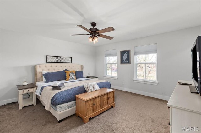 3208 Henrietta St, Saint Louis, MO 63104 - carpeted bedroom with baseboards and ceiling fan