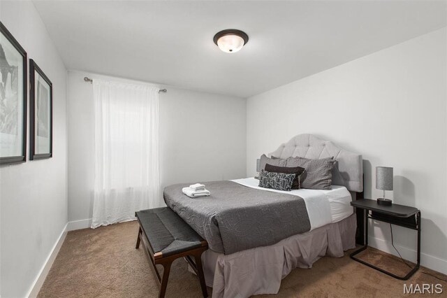 3208 Henrietta St, Saint Louis, MO 63104 - carpeted bedroom featuring baseboards