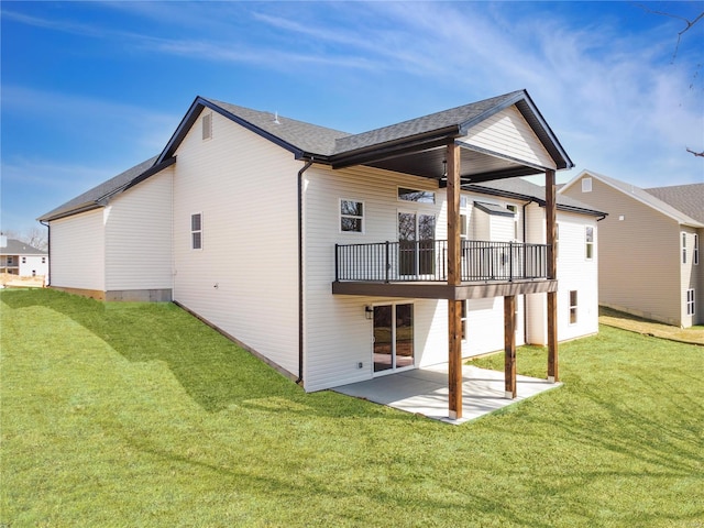 220 Great Bear Pass, Foristell, MO 63348 - rear view of house with a patio area, a lawn, a wooden deck, and a shingled roof