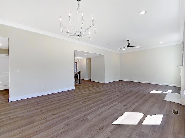 220 Great Bear Pass, Foristell, MO 63348 - unfurnished living room featuring a chandelier, ornamental molding, baseboards, recessed lighting, and a ceiling fan