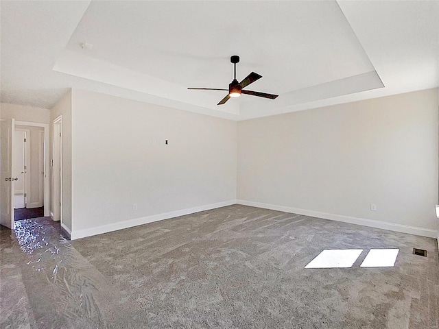 220 Great Bear Pass, Foristell, MO 63348 - unfurnished room with a raised ceiling, ceiling fan, baseboards, and carpet floors