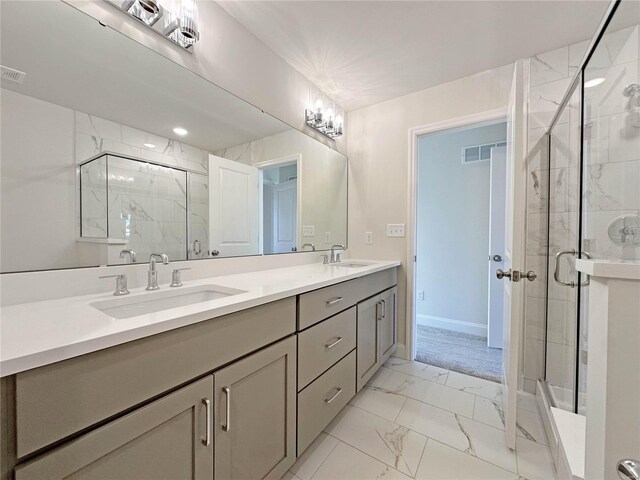220 Great Bear Pass, Foristell, MO 63348 - bathroom with marble look tiles, a stall shower, double vanity, and baseboards