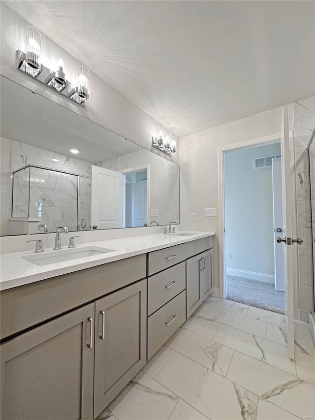 220 Great Bear Pass, Foristell, MO 63348 - bathroom featuring marble finish flooring, a marble finish shower, and double vanity