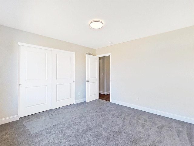 220 Great Bear Pass, Foristell, MO 63348 - unfurnished bedroom featuring carpet flooring, baseboards, and a closet