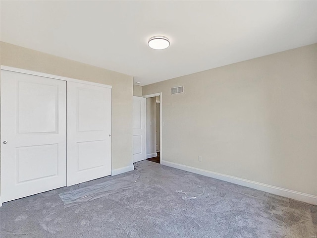 220 Great Bear Pass, Foristell, MO 63348 - unfurnished bedroom featuring carpet flooring, baseboards, and a closet