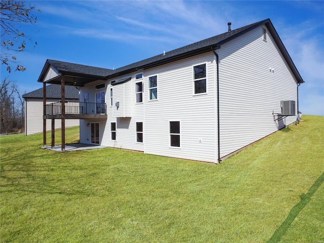 220 Great Bear Pass, Foristell, MO 63348 - rear view of property with central AC unit, a yard, a patio area, and roof with shingles