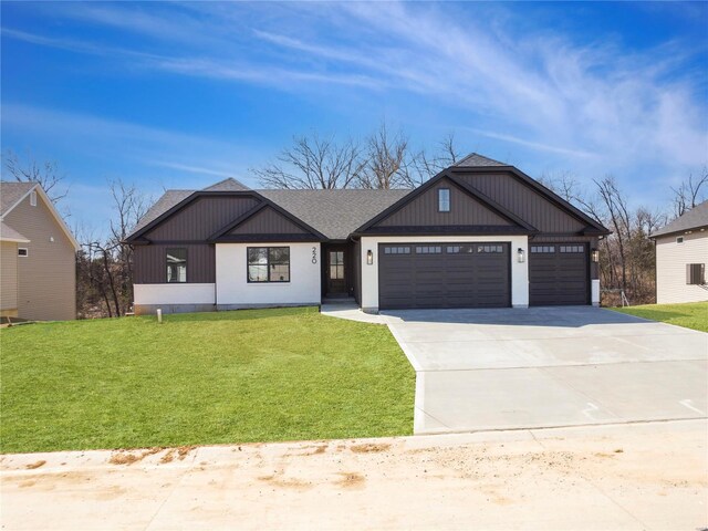 220 Great Bear Pass, Foristell, MO 63348 - modern inspired farmhouse with a garage, a front lawn, concrete driveway, and a shingled roof