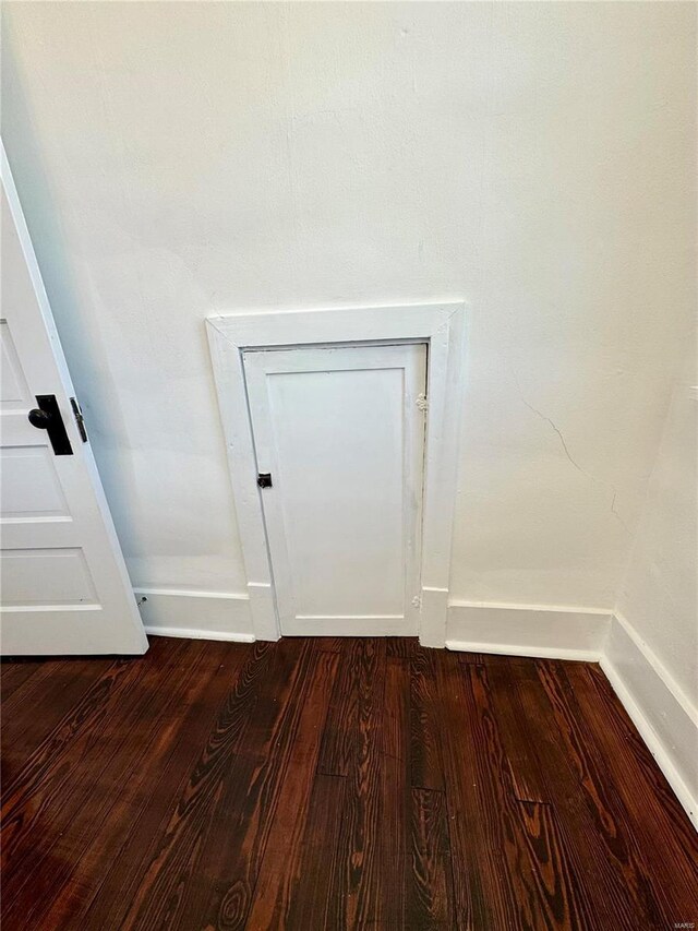 1522 E 5th St, Washington, MO 63090 - detailed view of wood finished floors and baseboards