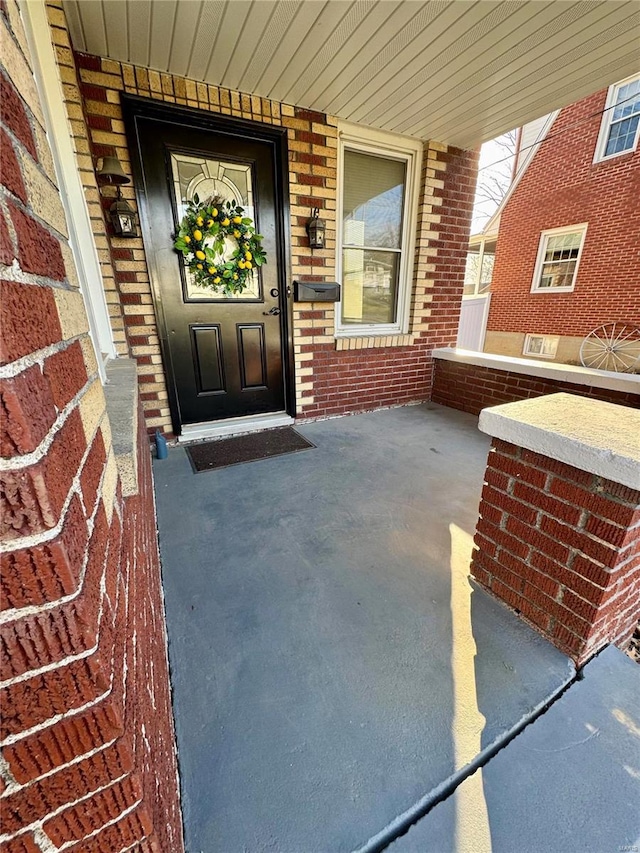 1522 E 5th St, Washington, MO 63090 - view of exterior entry with brick siding and covered porch