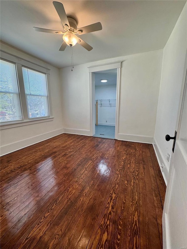 1522 E 5th St, Washington, MO 63090 - spare room featuring hardwood / wood-style flooring, ceiling fan, and baseboards