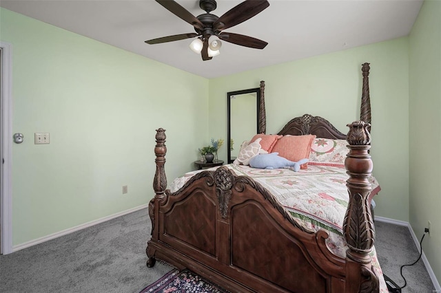 carpeted bedroom with baseboards and a ceiling fan