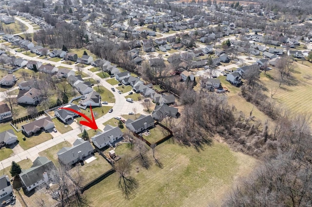 aerial view of property's location with nearby suburban area