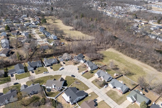 aerial view of property and surrounding area with nearby suburban area